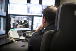 Department of public safety Officer Jeff Mertell works on an investigation using footage from one of the 500 cameras on campus. The new cameras are one of the improvements DPS has made this semester.