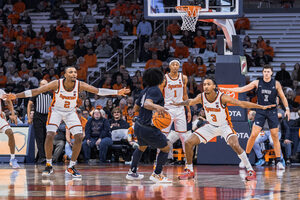 After defeating LSU 80-57 in the inaugural ACC/SEC Challenge, Syracuse travels to face Virginia in its first conference game of the season. 