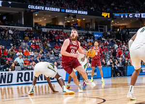 Colgate center Jeff Woodward, known for his smooth footwork in the post, leads the Raiders into their game against Syracuse tonight.