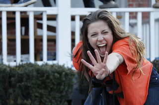 Alexa Driscoll, a freshman SU student celebrates Syracuse's rise to the Final Four outside of the Sigma Alpha Epsilon fraternity house.